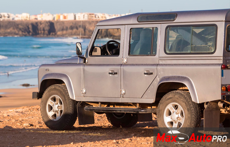 silver jeep on a beach